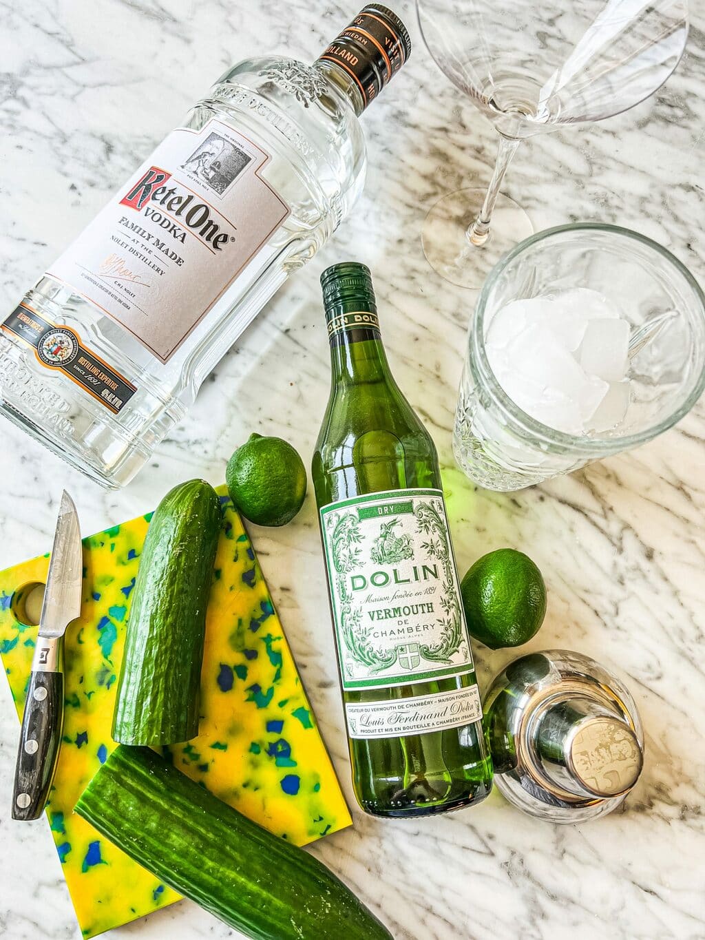 ketel one vodka, ice, limes, dry vermouth, cucumber, simple syrup