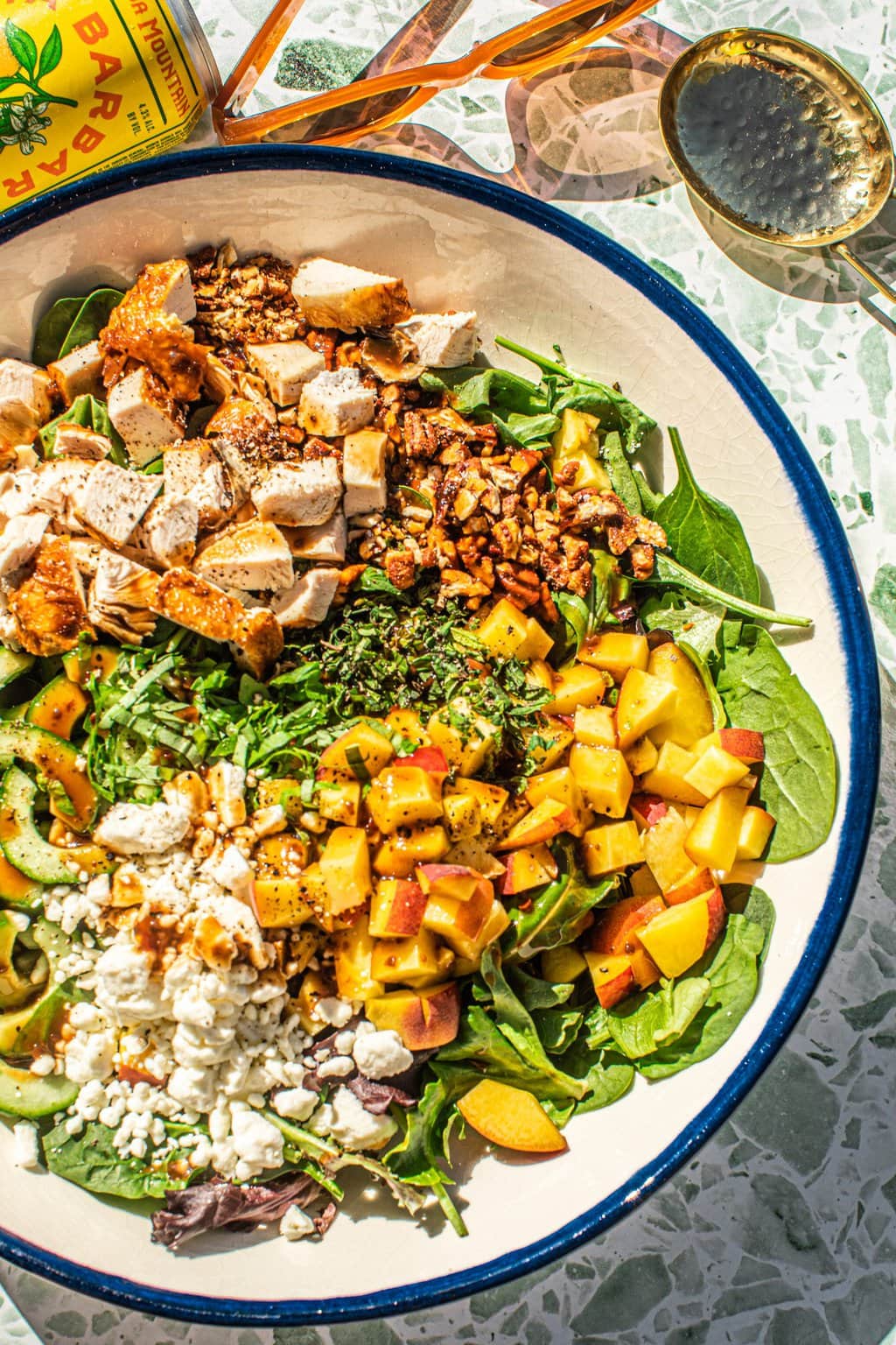 chopped peach salad in large white bowl