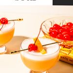 two tequila sour cocktails with bowl of maraschino cherries