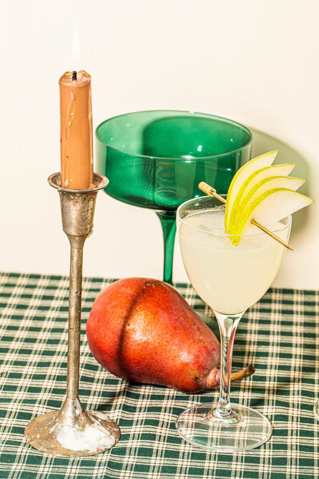 pear martini in glass garnished with fresh pear