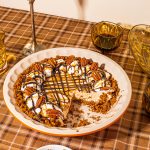 turtle pie in pie dish with slice taken out