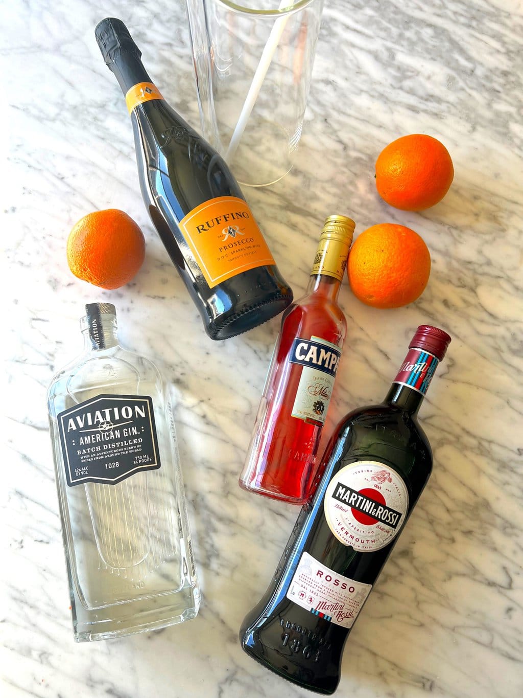 gin, oranges, prosecco, Campari, sweet vermouth