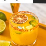 jalapeno mango margarita in low ball glass with tajin