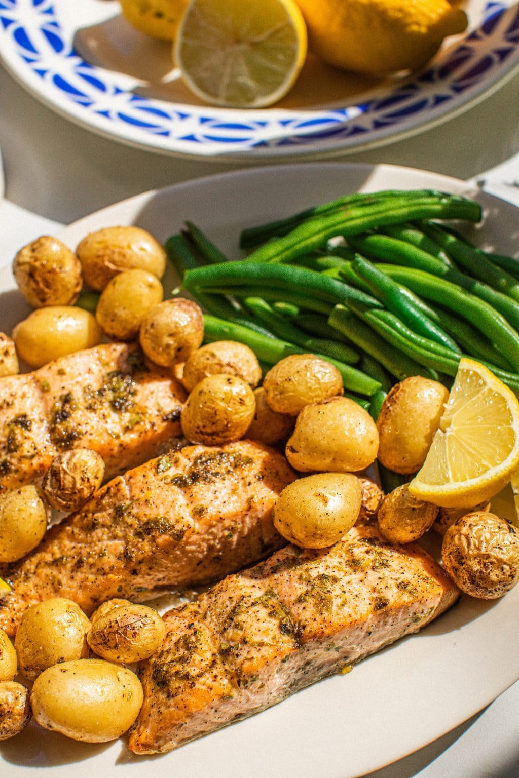 lemon pepper salmon served with yukon gold potatoes and green beans