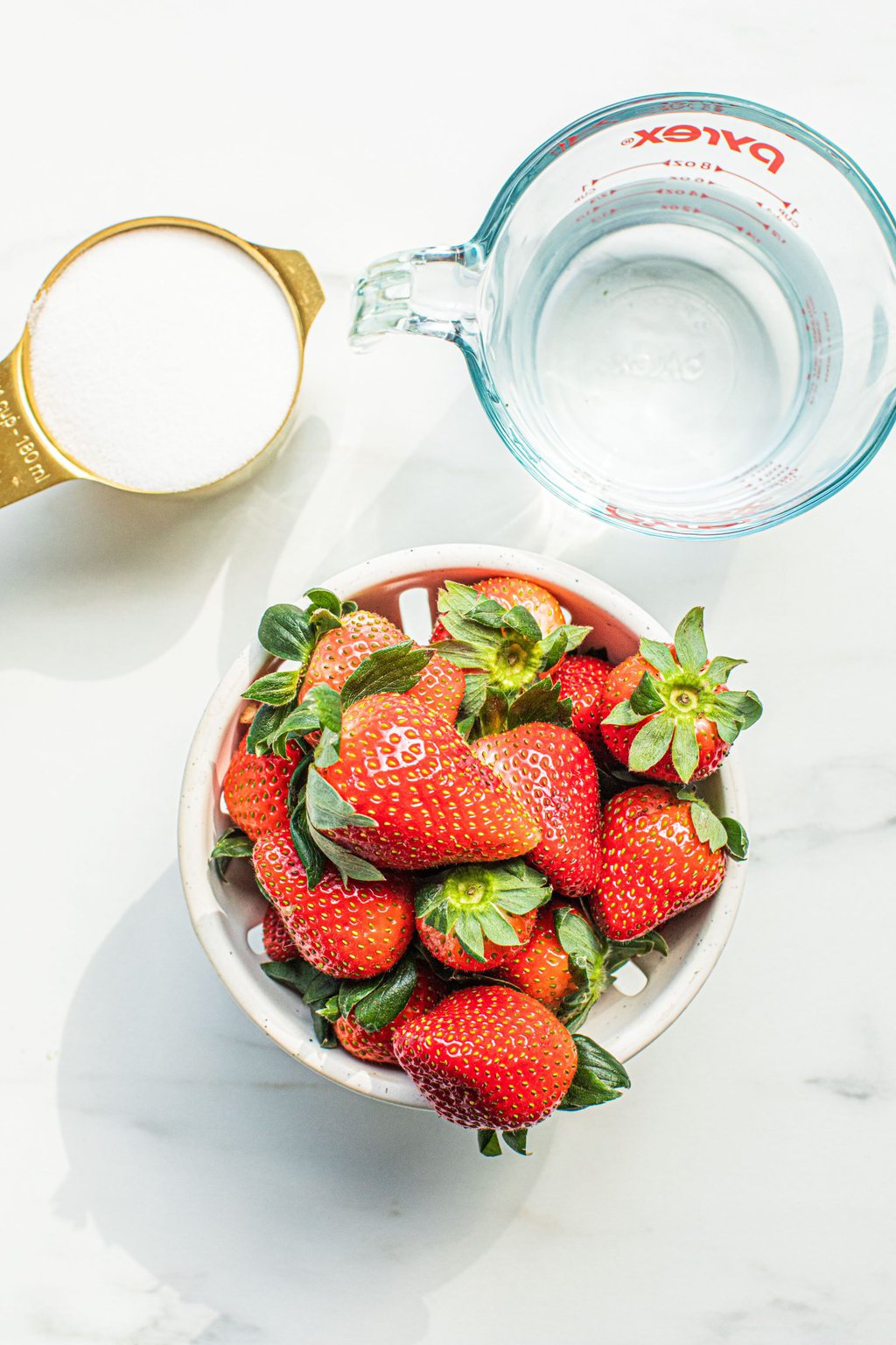 strawberries, sugar, and water