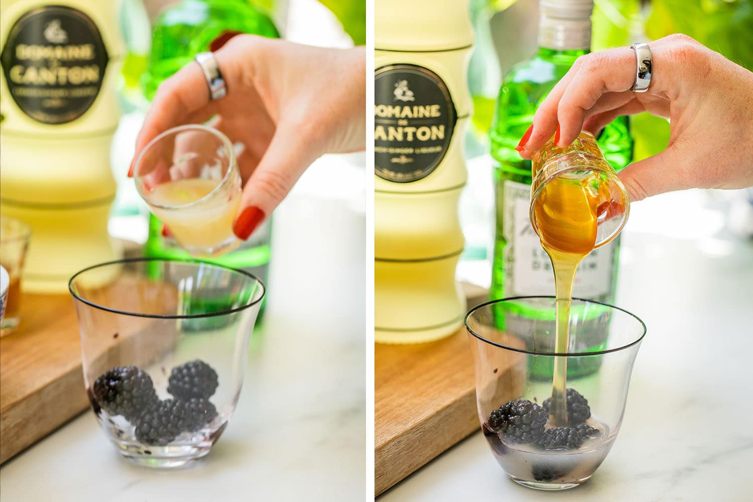 pouring lemon juice and honey into a glass of blackberries