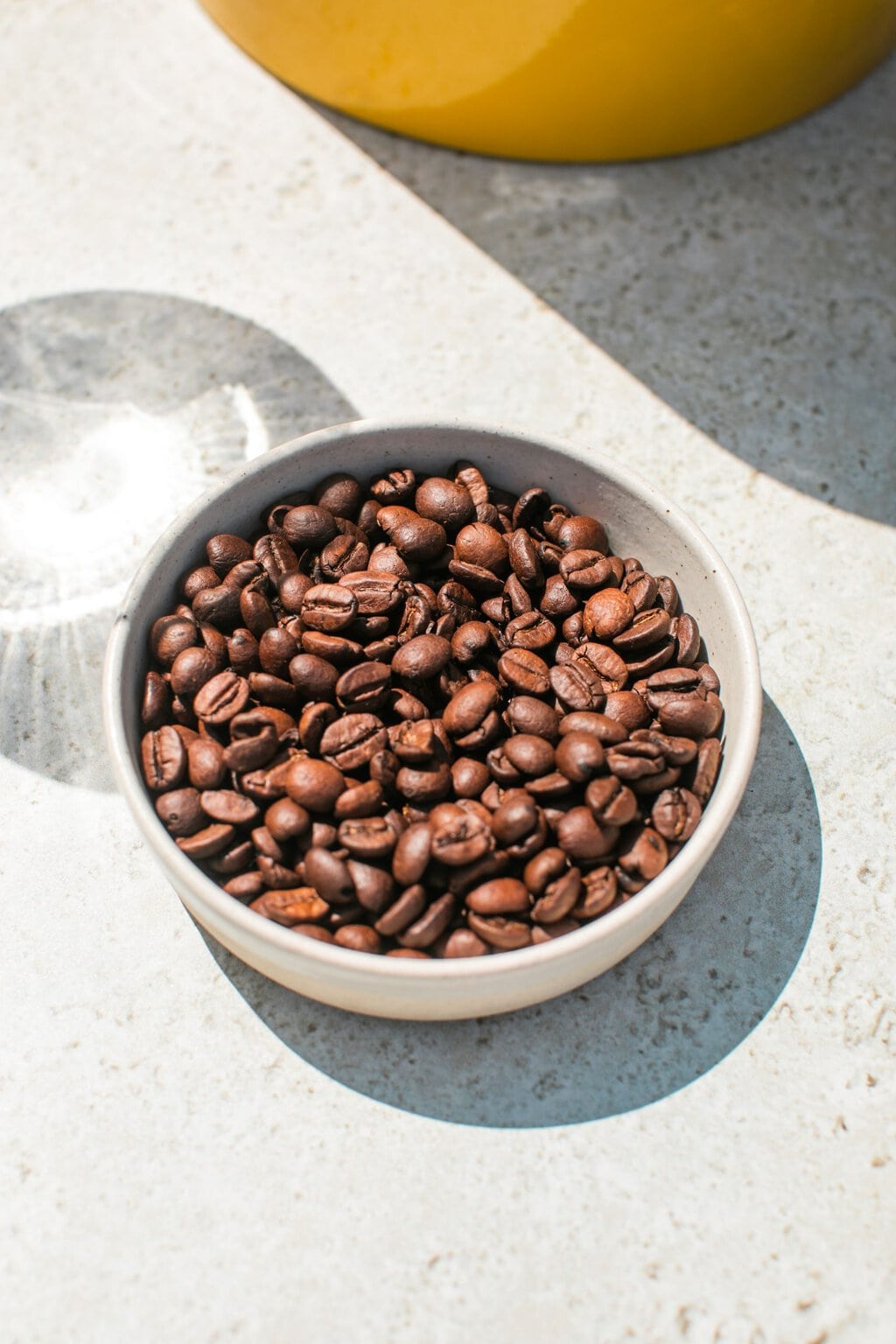 a bowl of espresso beans