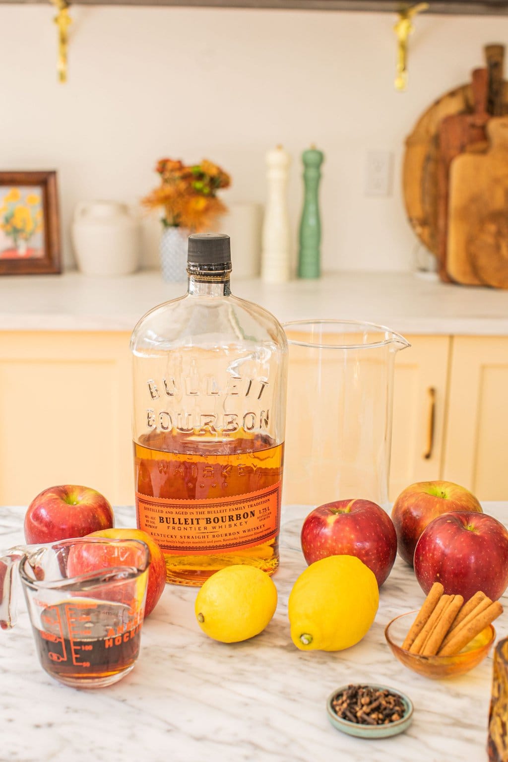 bourbon, apples, apple cider, star anise, lemons, and cinnamon sticks