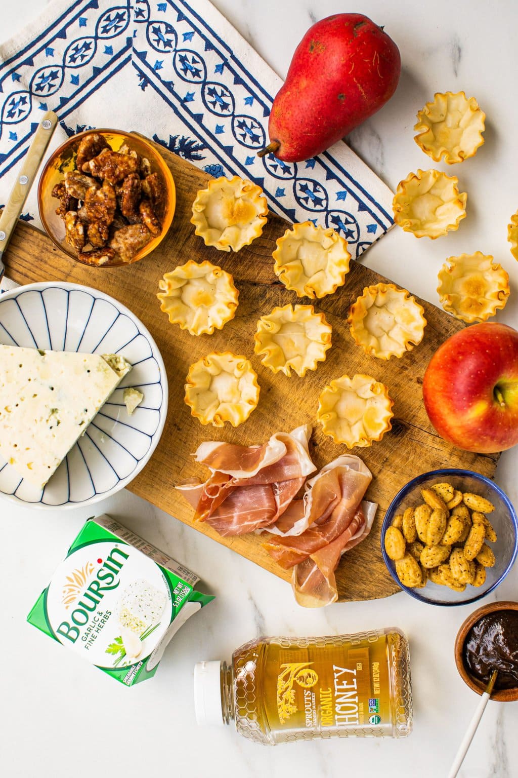 phyllo shells, apples, pears, boursin, blue cheese, prosciutto, marcona almonds, walnuts, honey