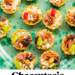 two different variations of charcuterie board bites on a green plate with text overlay on the bottom