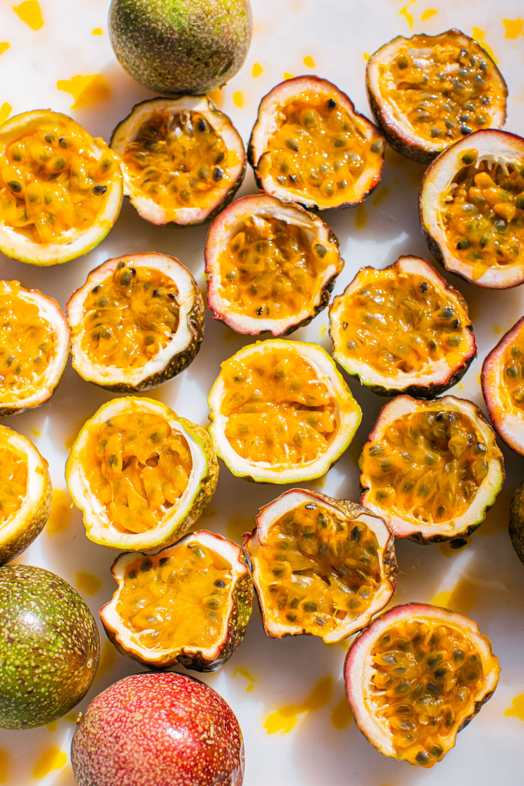 halves of passion fruit with the pulp showing