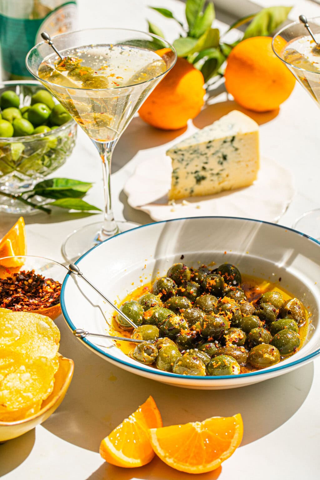 marinated olives in a bowl served with a martini