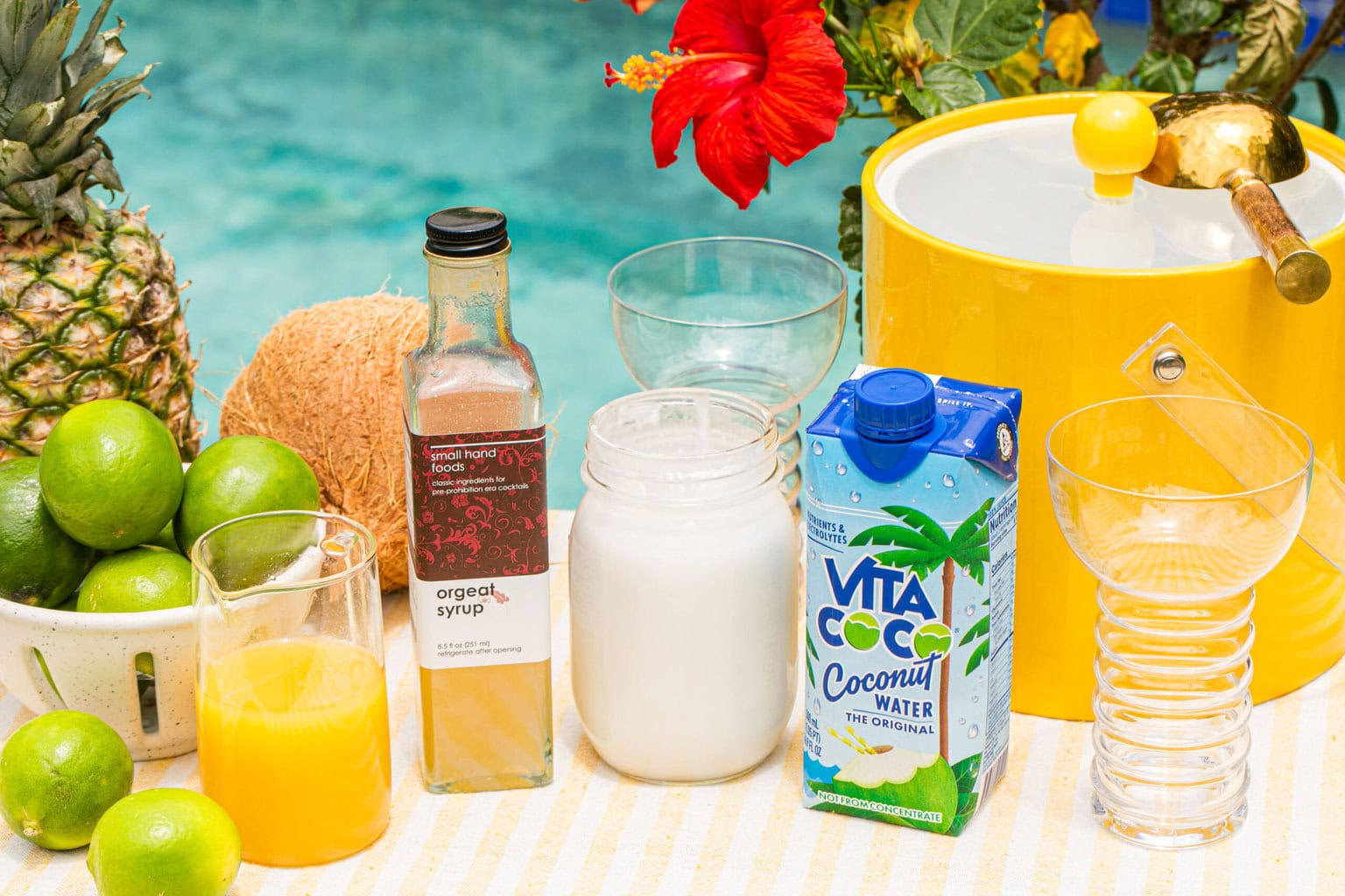 coconut water, orgeat syrup, coconut cream, pineapple juice, limes, and an ice bucket