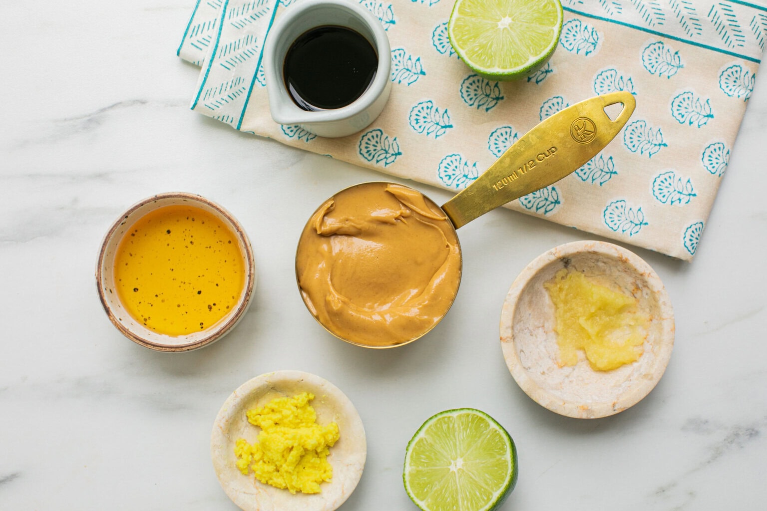 peanut butter, soy sauce, agave, lime juice, ginger, garlic, hot water