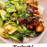 a bowl full of teriyaki salmon and veggies with white rice and text overlay at the bottom of the image that reads Teriyaki Salmon Bowls, Easy Lunch Or Dinner